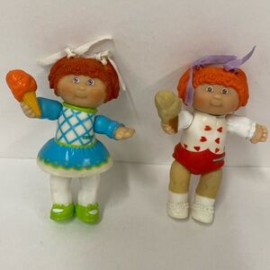 Vintage 1984 Cabbage Patch kids 2 girls- 1 redhead 1 brown haired holding cones